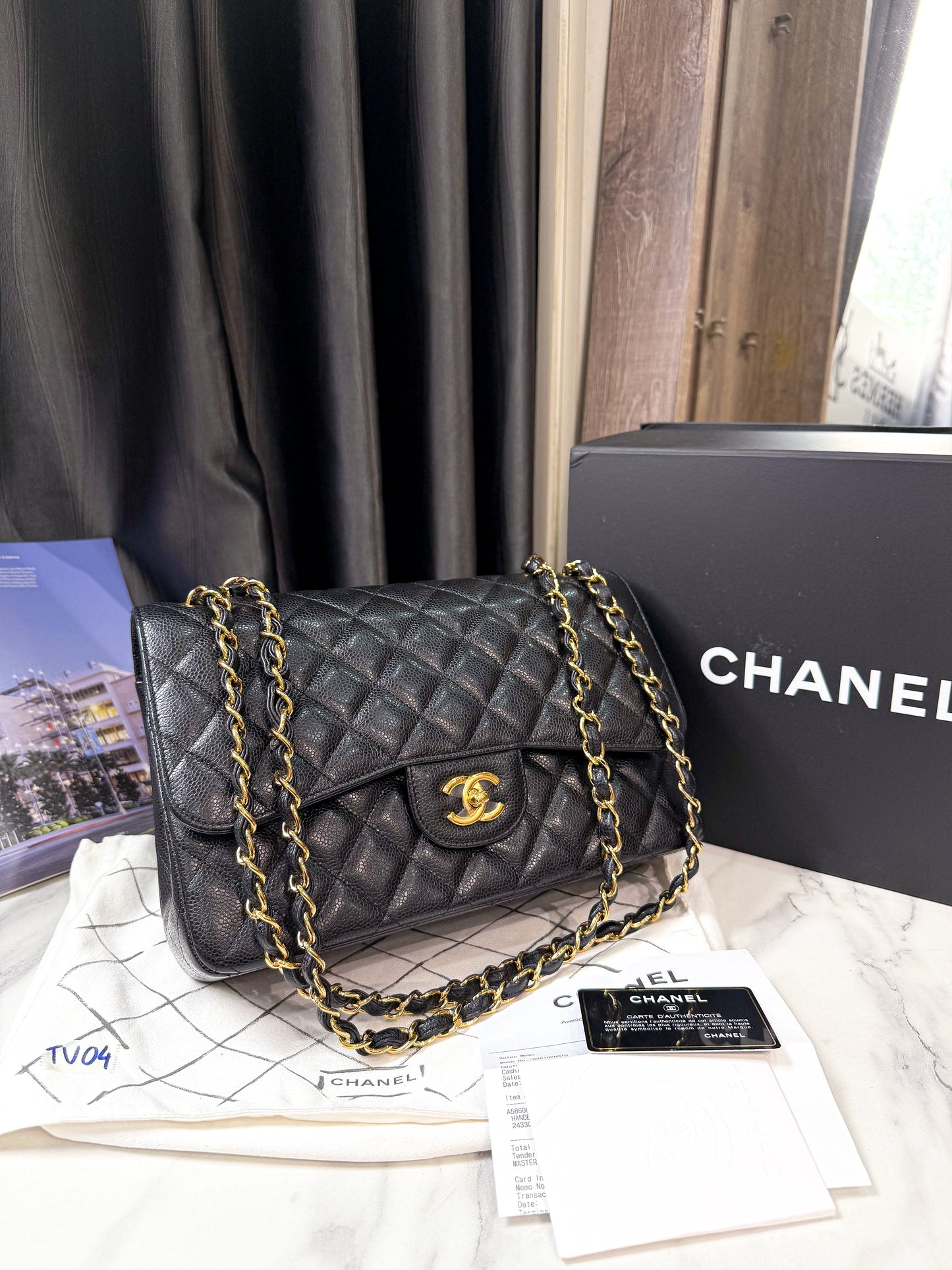 A A Chanel Classic Jumbo Caviar