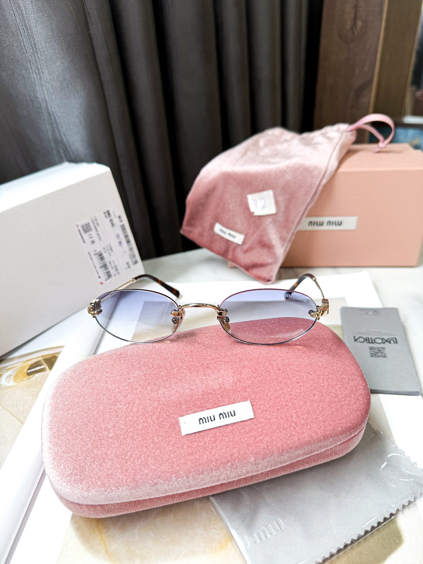 Kính MiuMiu New K2