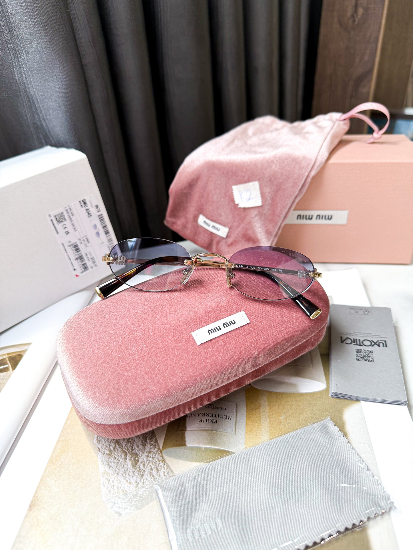 Kính MiuMiu New K2