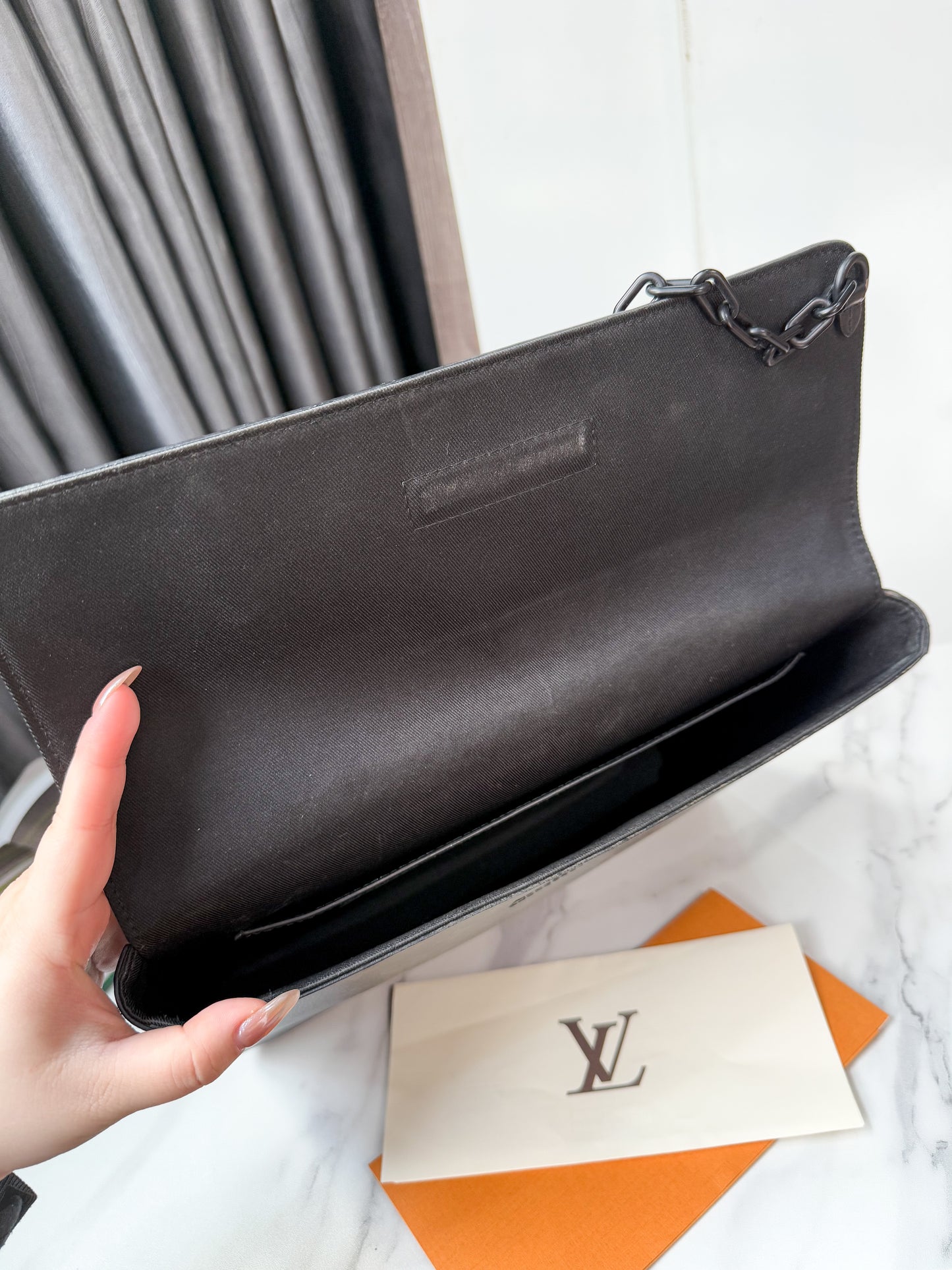 A LV Steamer Clutch