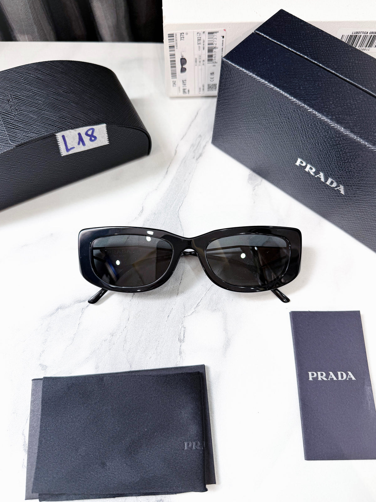 Kính Prada New L18