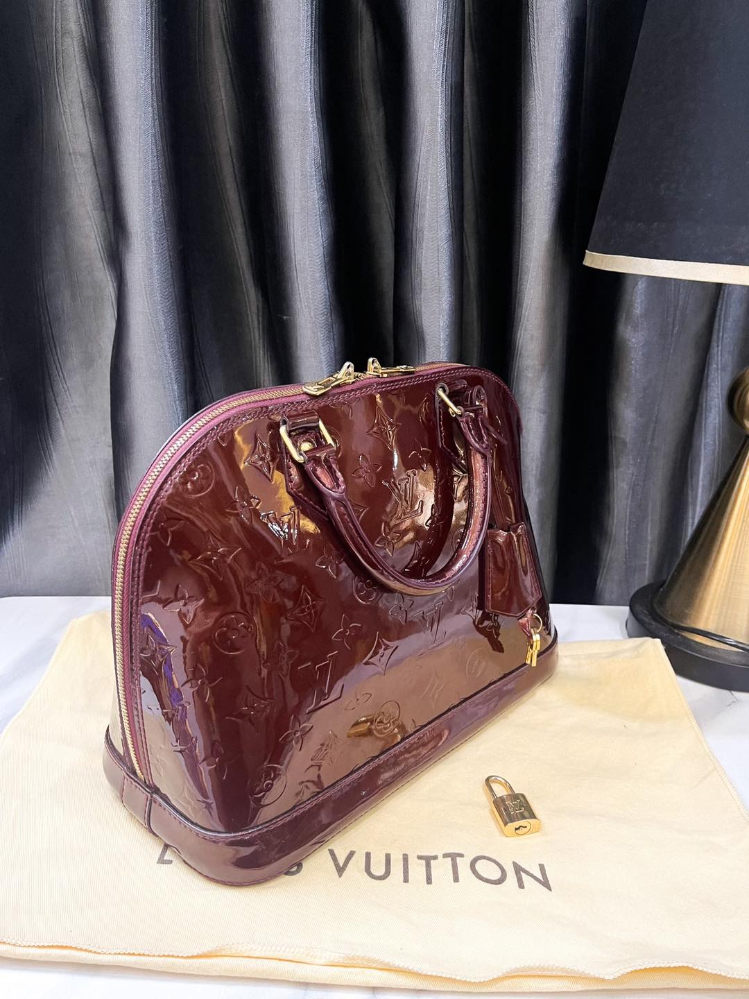 LV Alma PM Vernis