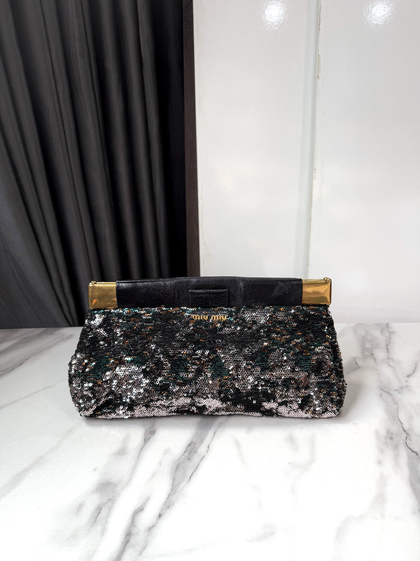 A Clutch MiuMiu