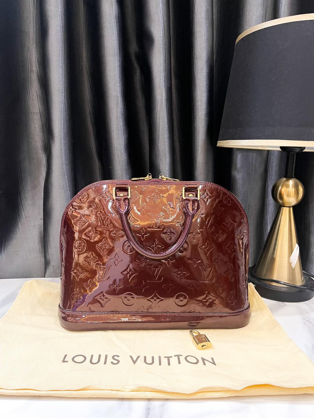 LV Alma PM Vernis