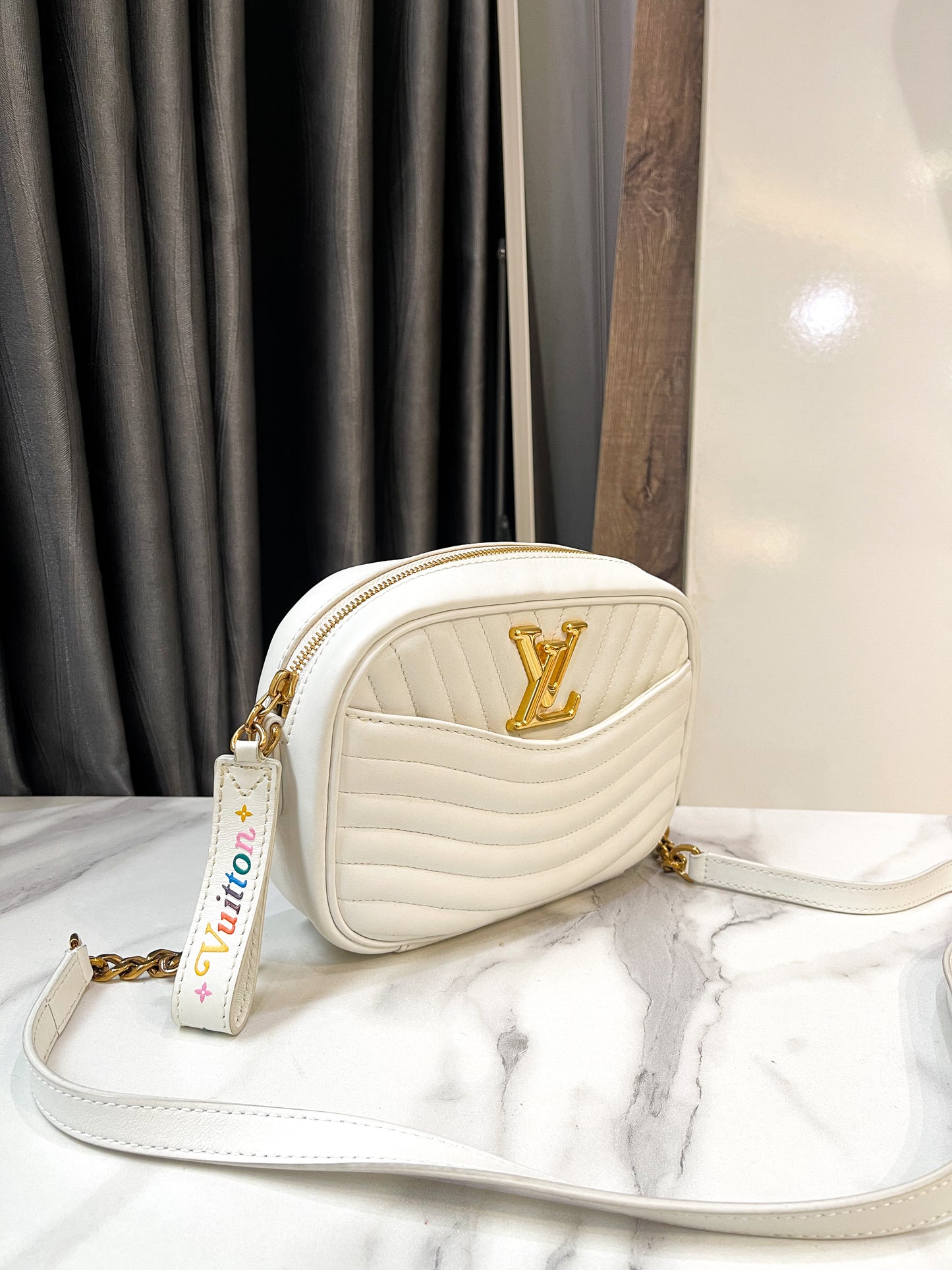 A LV Wave Crossbody