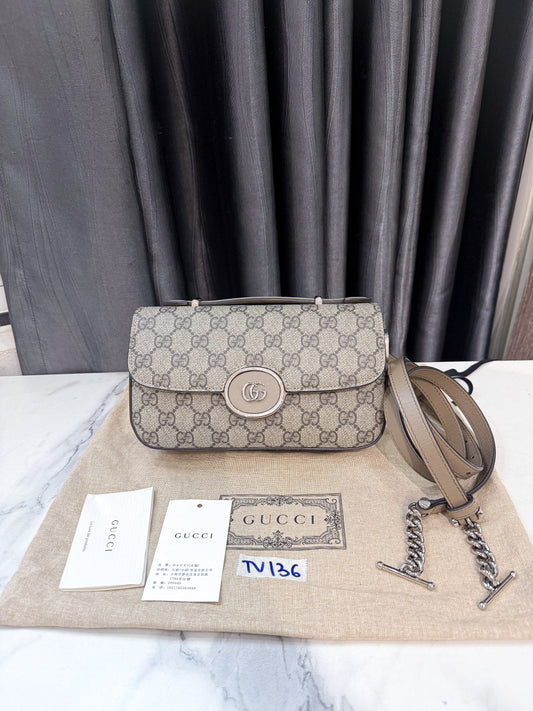 A A Gucci Petite New TV136