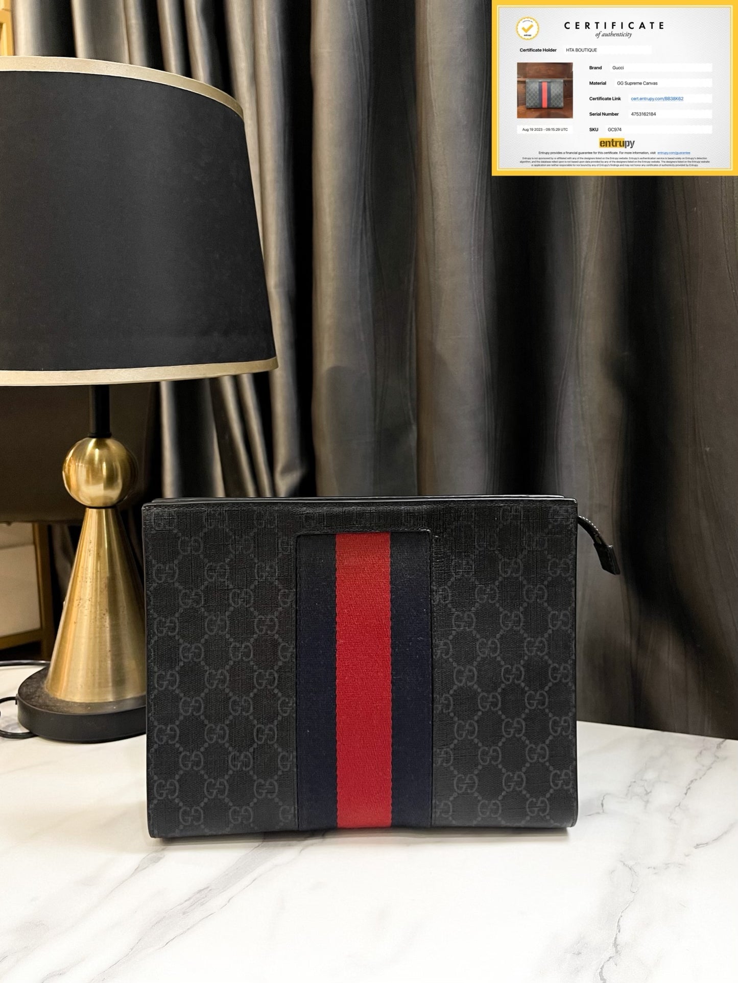 Gucci Clutch GG Sọc Đỏ