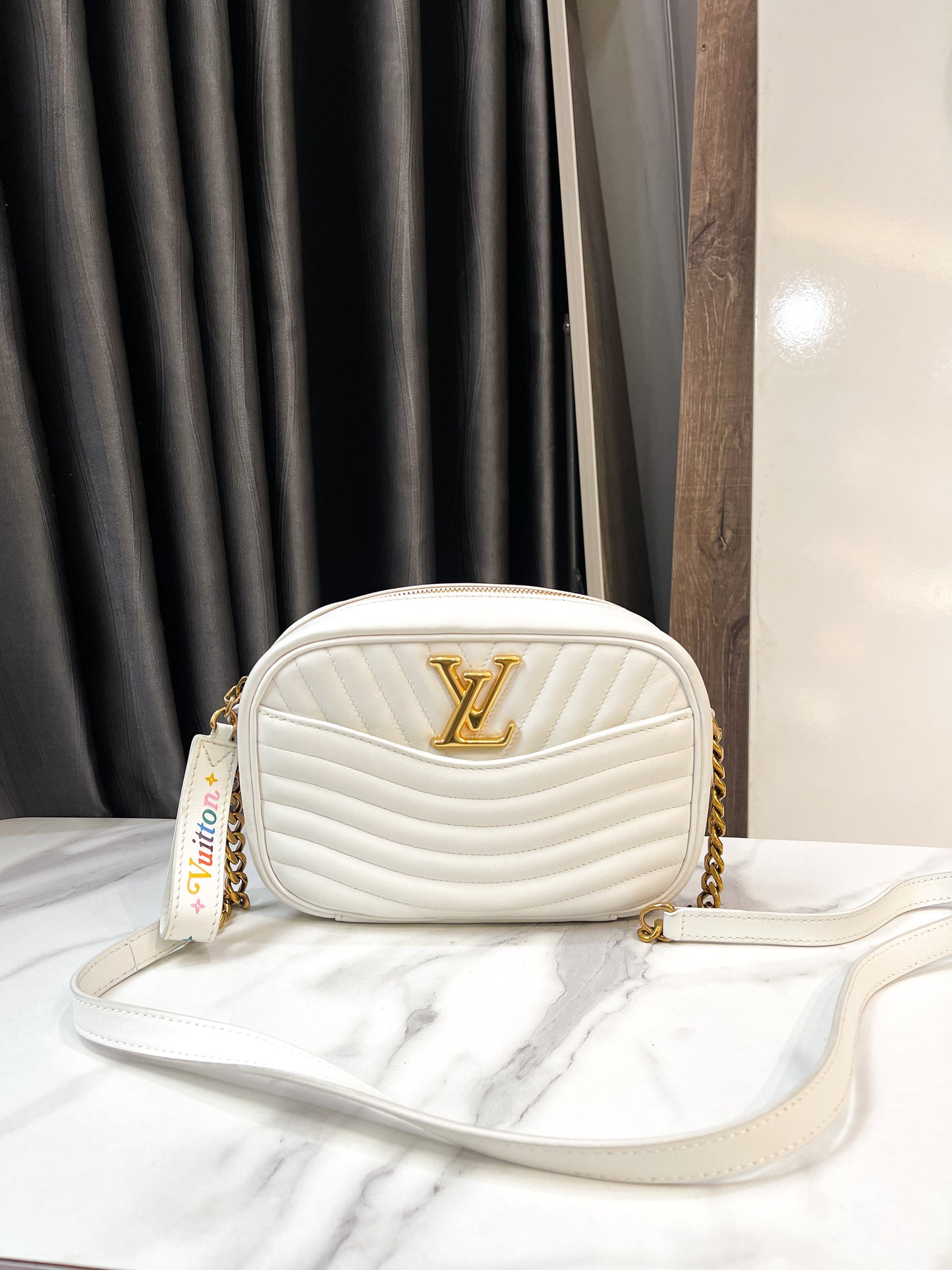 A LV Wave Crossbody