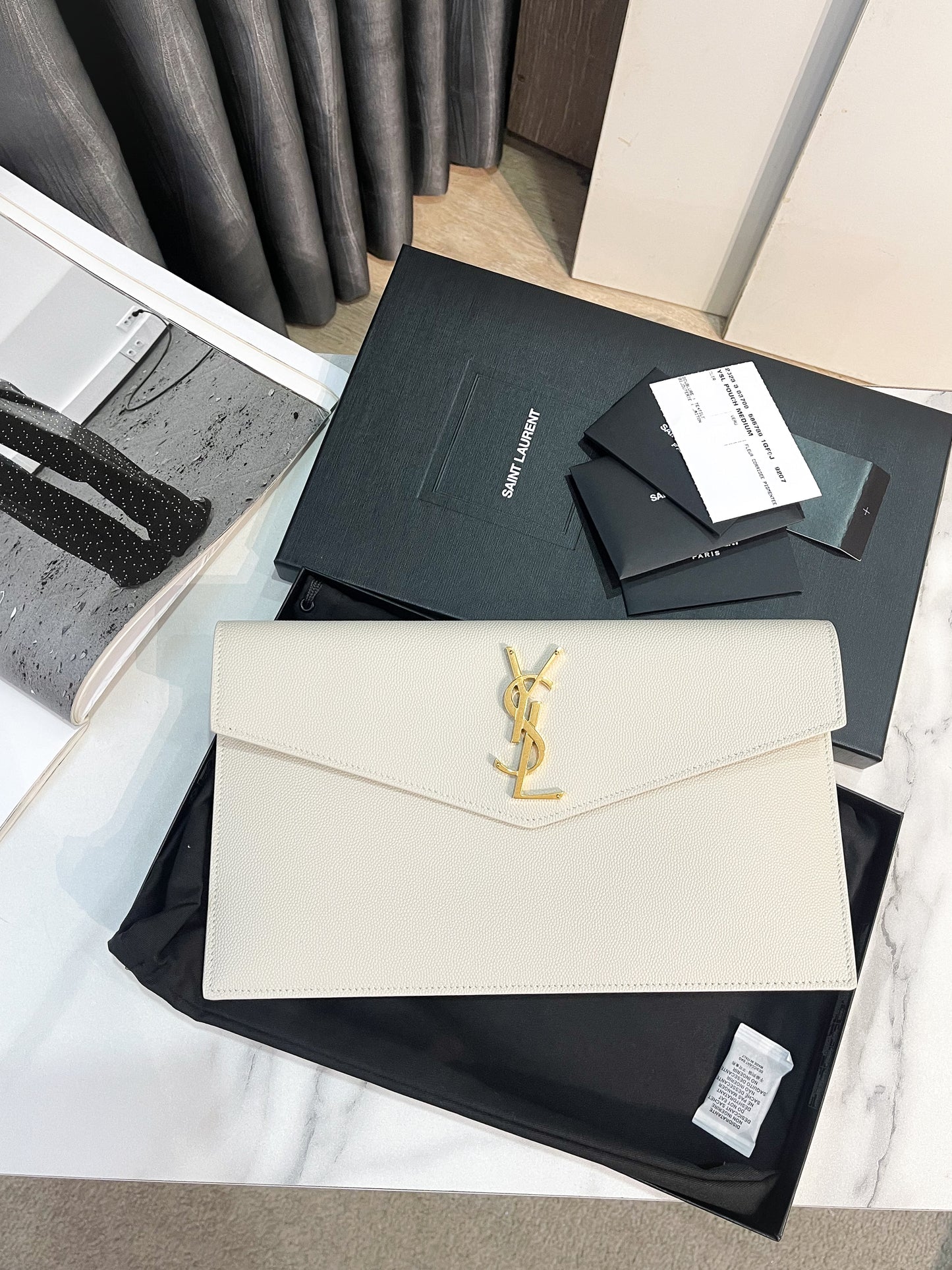 A Clutch YSL New Trắng