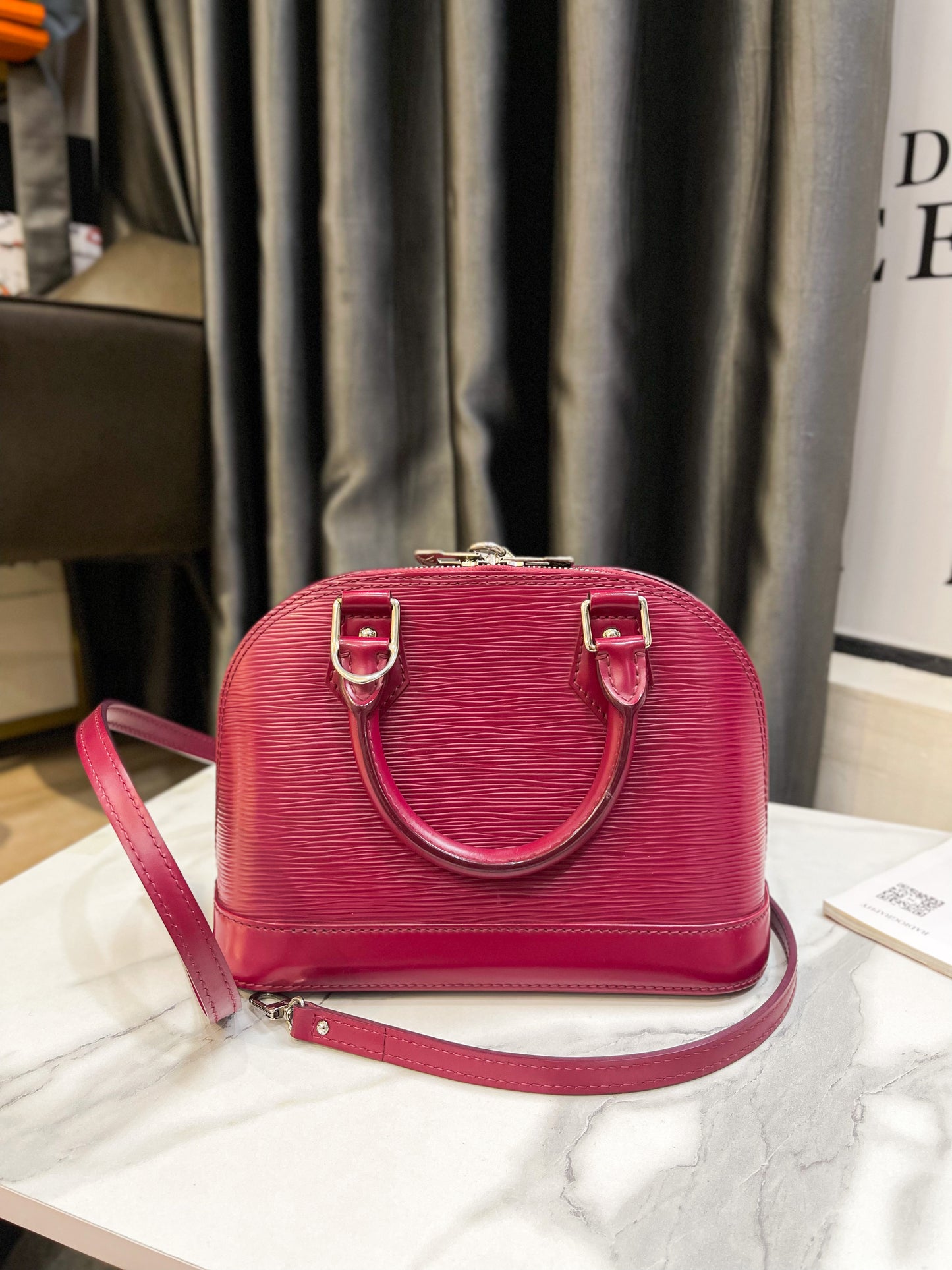 LV Alma BB Epi Fuchsia