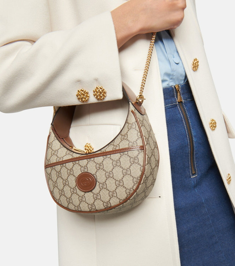 A A Gucci Half Moon TV151