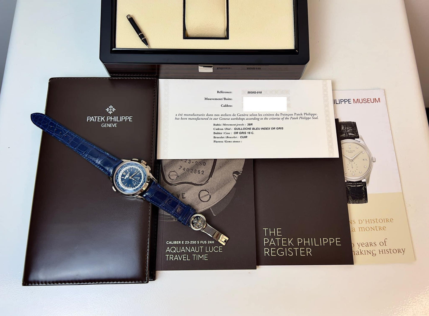 Đồng Hồ Patek Philippe 5930G World Time Chronograph 18K White Gold