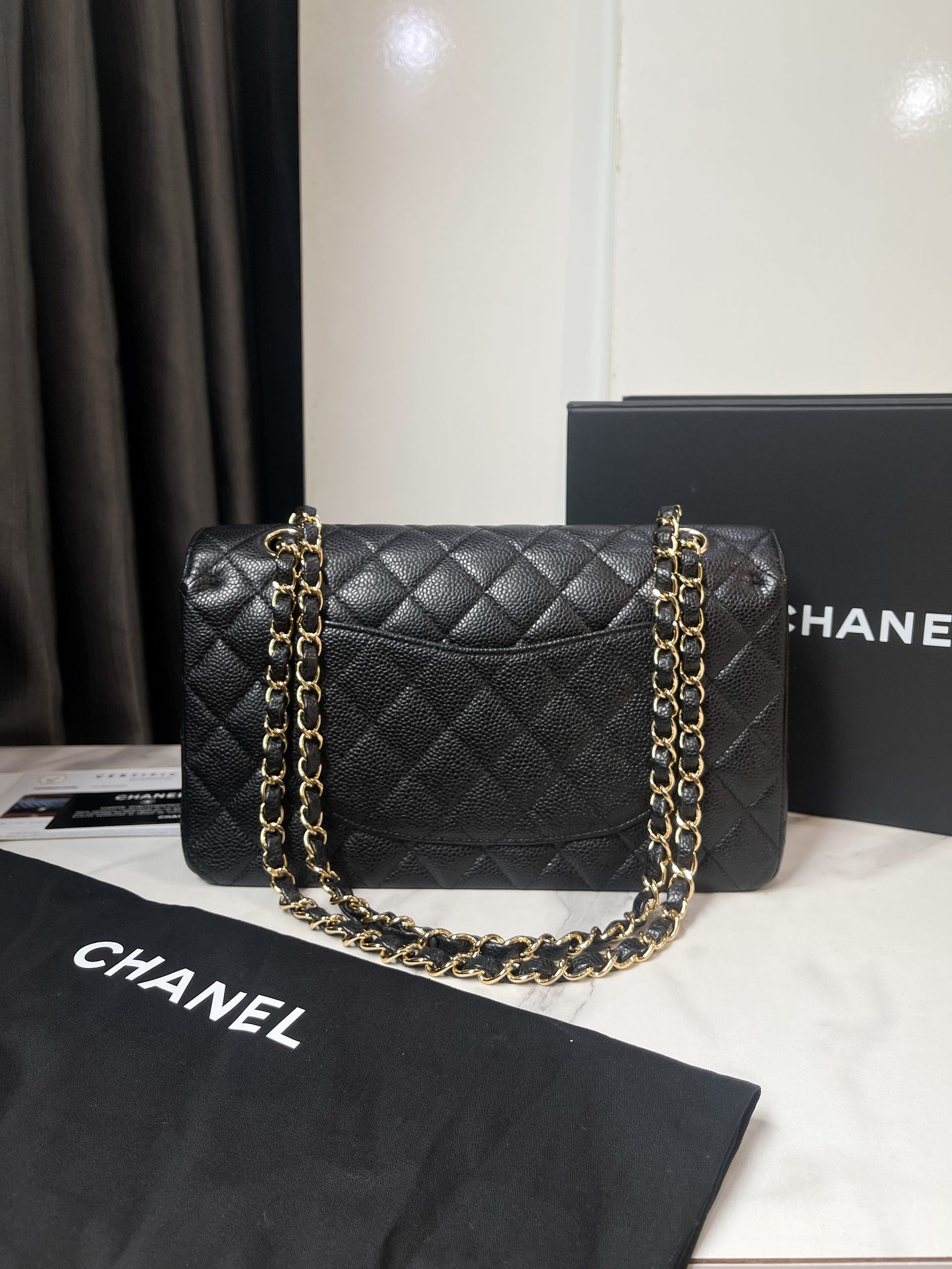 A A Chanel Classic M Caviar